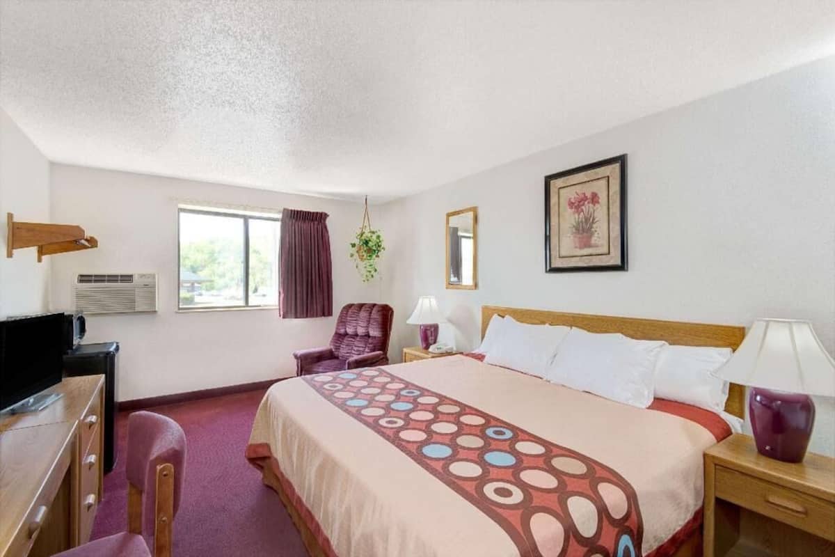 Desk, laptop workspace, blackout curtains, free WiFi