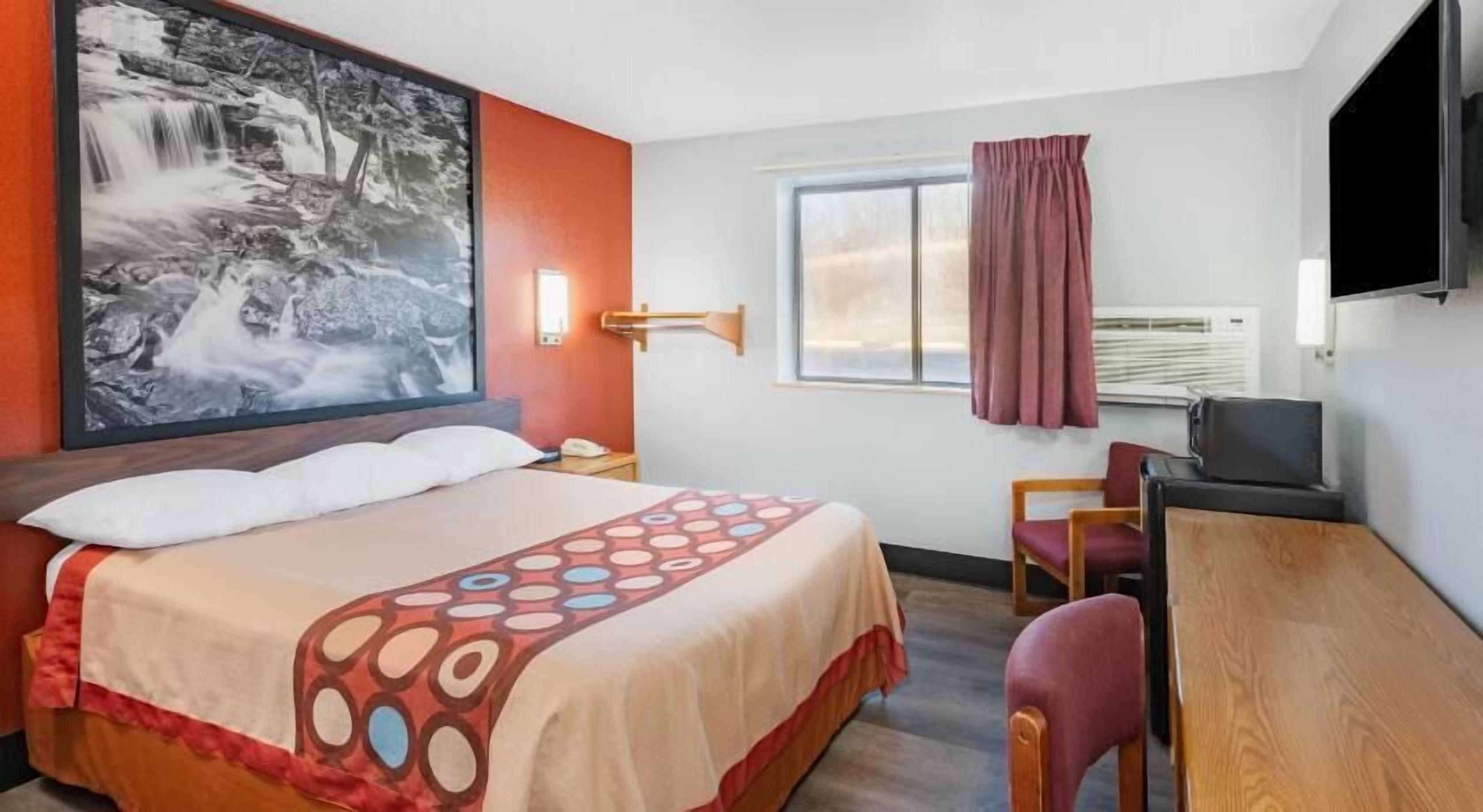 Desk, laptop workspace, blackout curtains, free WiFi