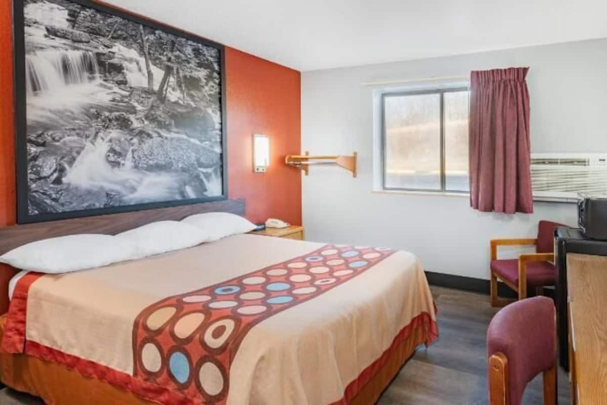 Desk, laptop workspace, blackout curtains, free WiFi
