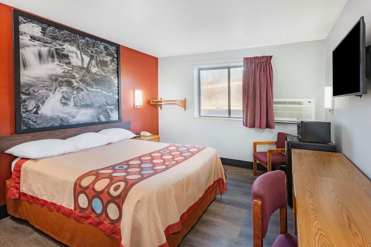 Desk, laptop workspace, blackout curtains, free WiFi