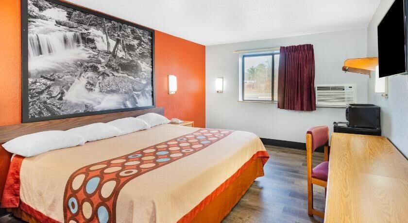 Desk, laptop workspace, blackout curtains, free WiFi