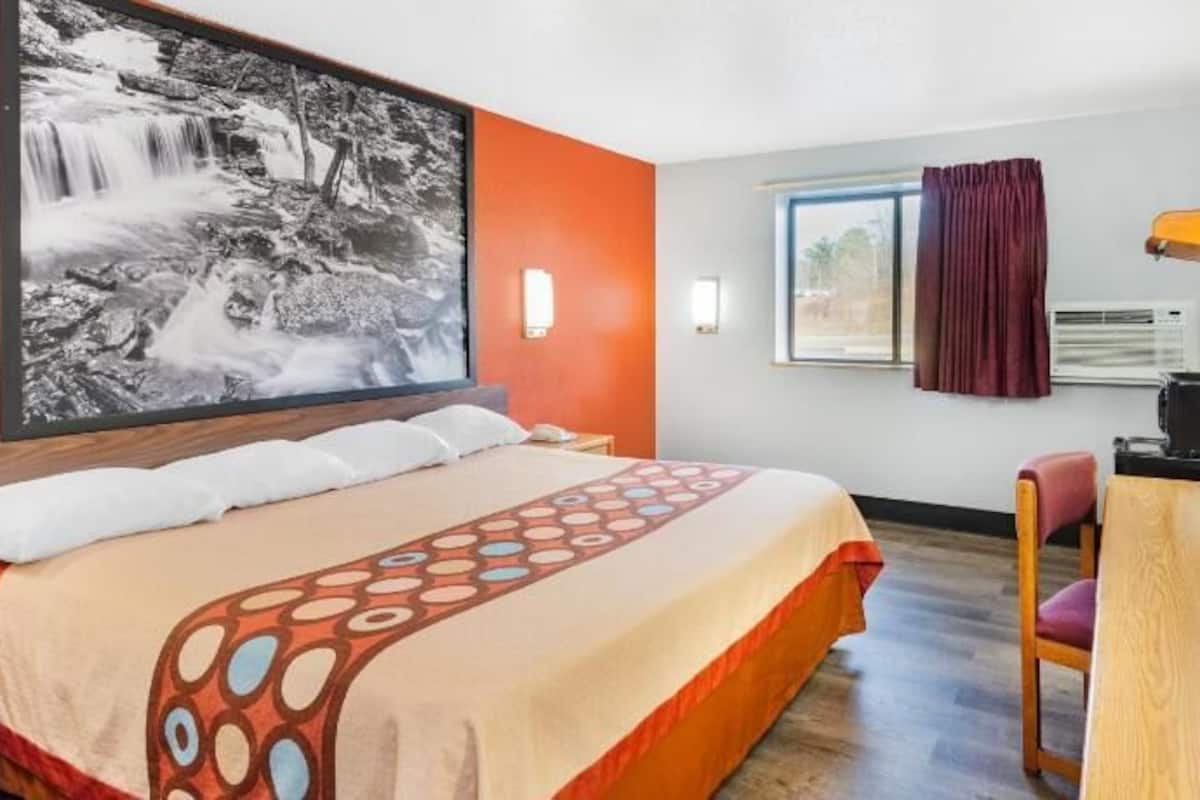 Desk, laptop workspace, blackout curtains, free WiFi