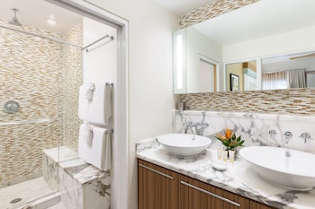 Designer toiletries, hair dryer, towels at Santa Maria Suites