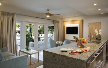 Luxury 2 Bedroom Poolview Flat Suite | Private kitchen | Fridge, microwave, coffee/tea maker, electric kettle at Santa Maria Suites