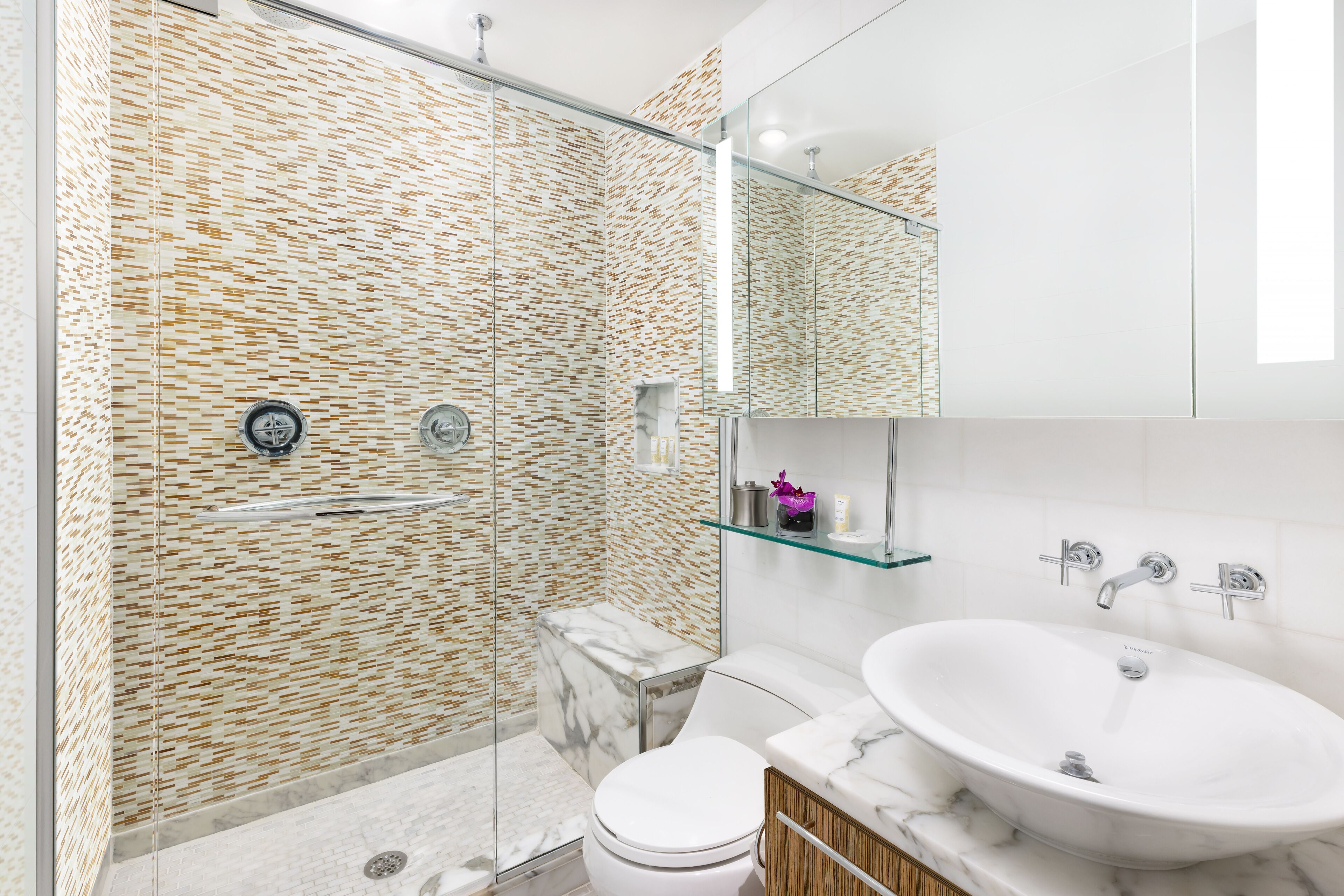 designer toiletries, hair dryer, towels