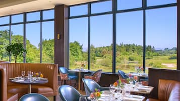 Breakfast, lunch, dinner served; golf course views