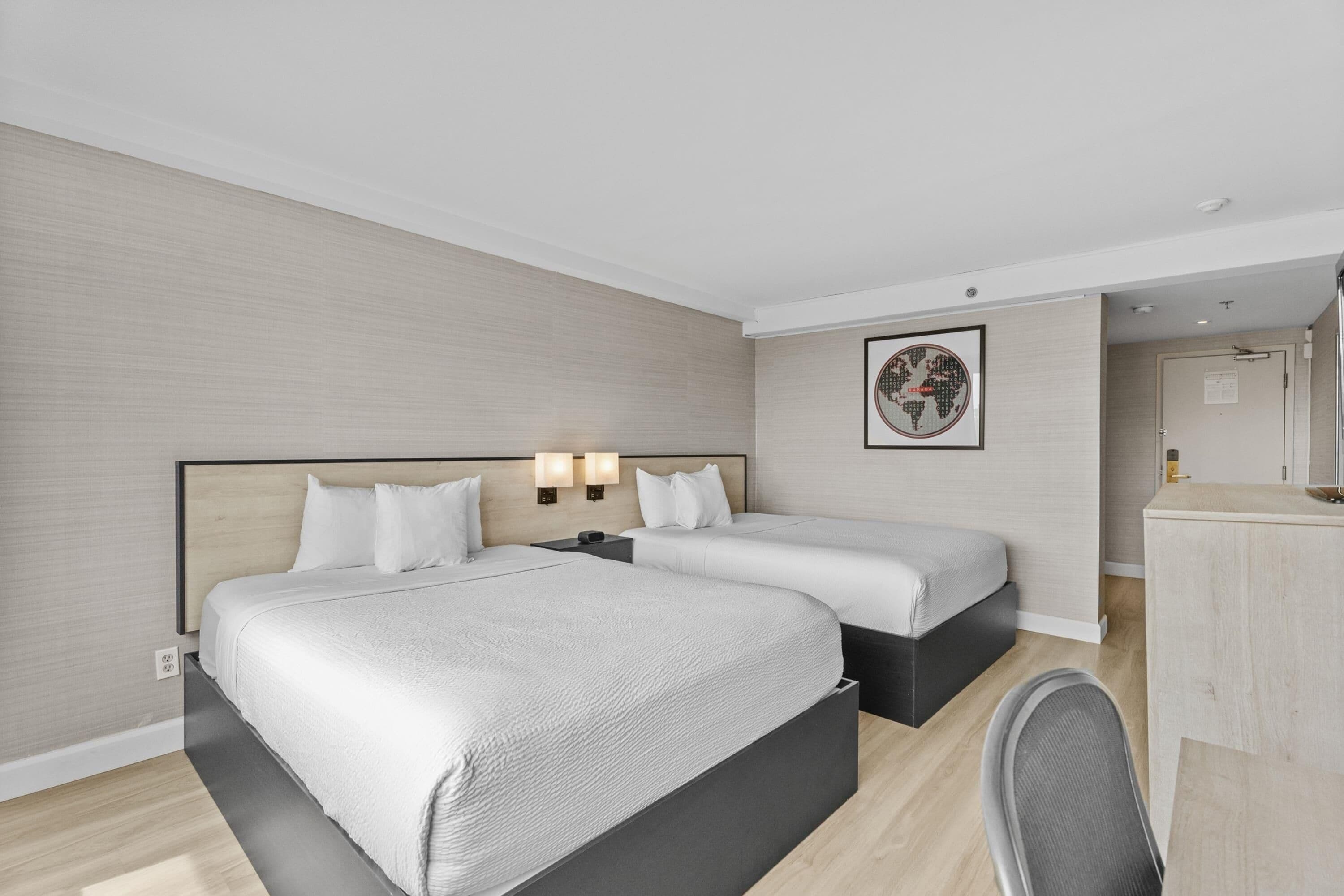 Room, 2 Queen Beds, Non Smoking | Desk, laptop workspace, blackout curtains, iron/ironing board