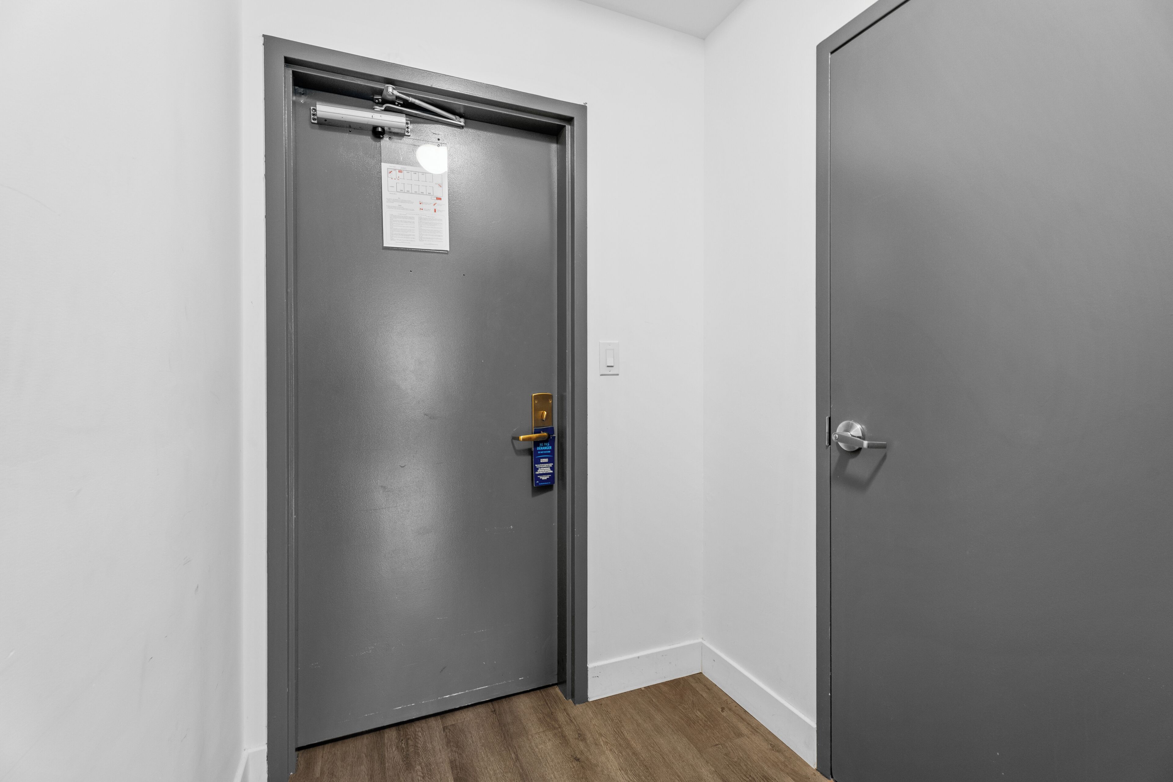 Suite, 1 King Bed, Non Smoking | Desk, laptop workspace, blackout drapes, iron/ironing board