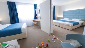 Suíte família | Roupas de cama premium, cofres nos quartos, escrivaninha