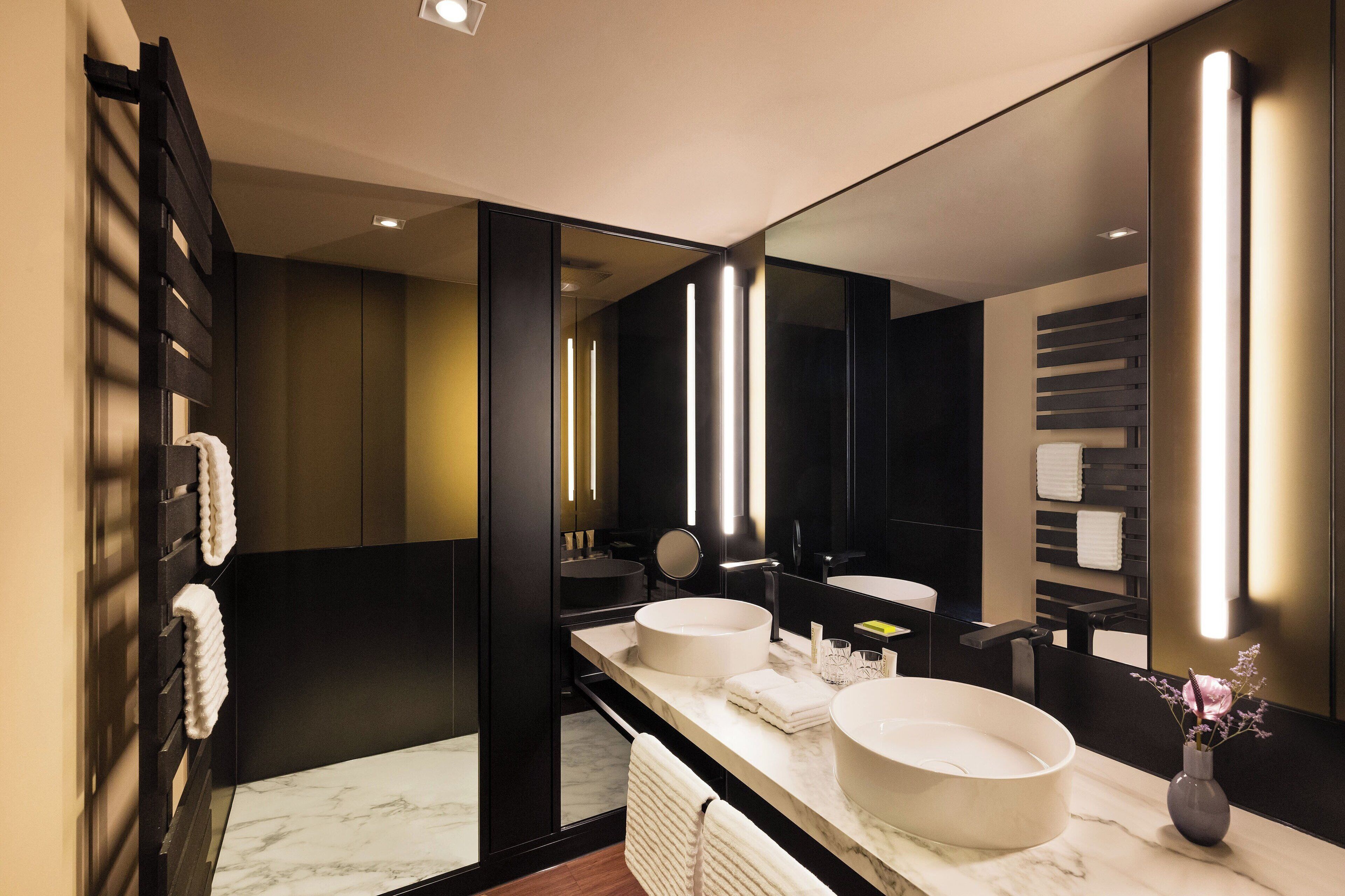 suite, 1 king bed, non smoking, balcony (view) | bathroom | separate bathtub and shower, free toiletries, hair dryer, bathrobes