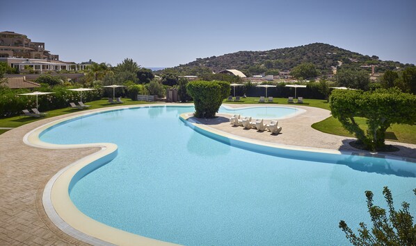Seasonal outdoor pool, pool umbrellas, pool loungers