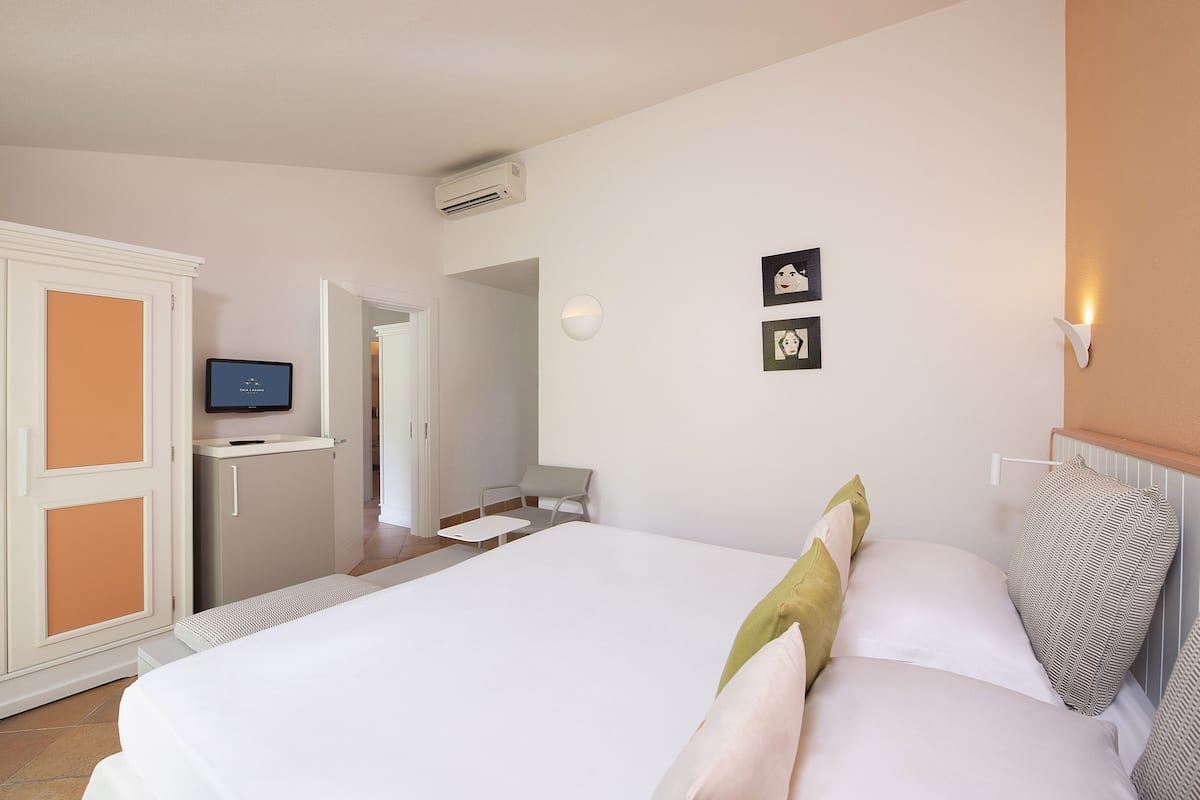 1 habitación, minibar y caja de seguridad en la habitación