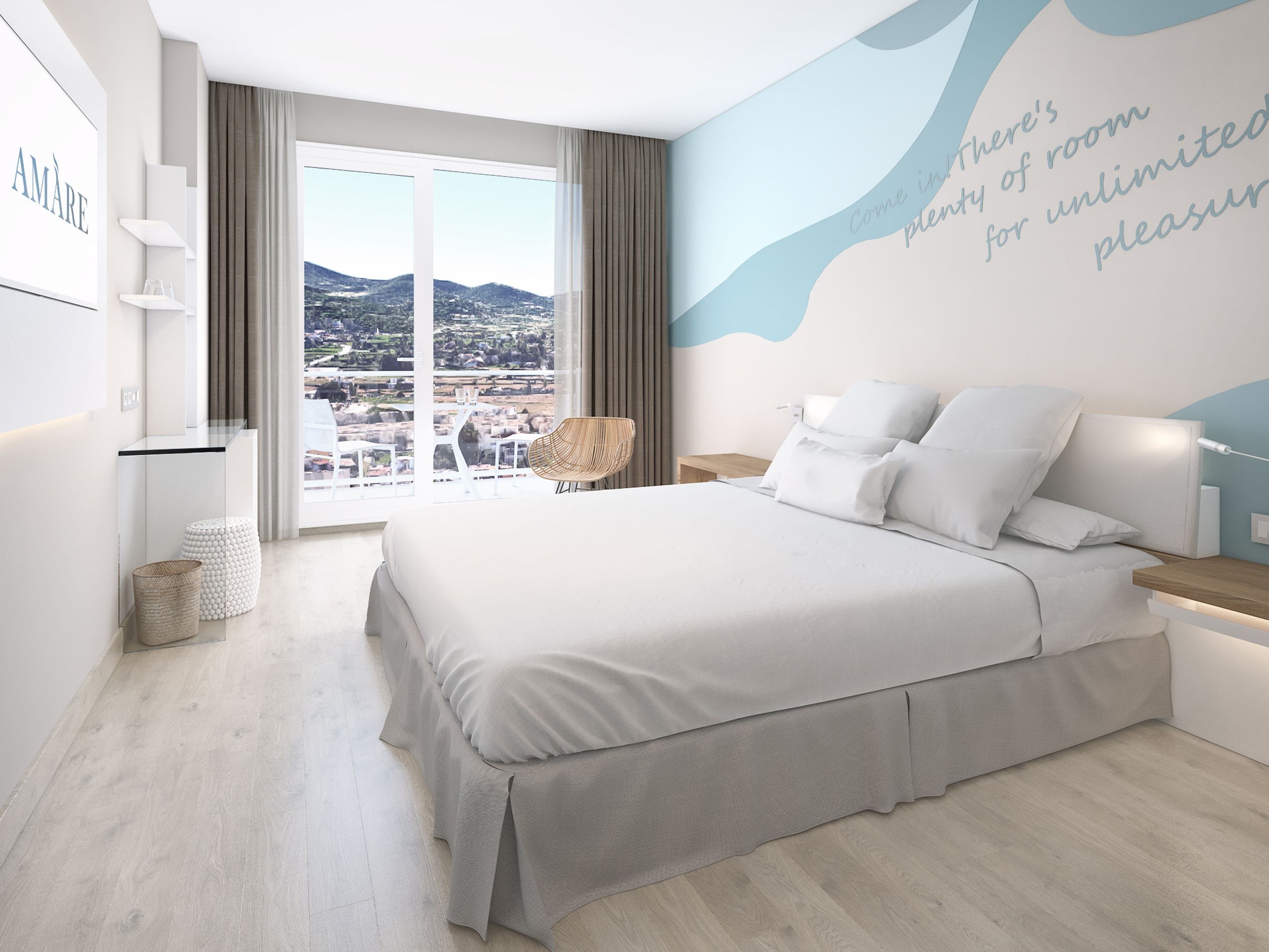 A modern bedroom with a large bed, a view of a cityscape through a sliding door, and a wall with a welcoming message.