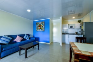 Suite, 1 Bedroom | Living area | LCD TV