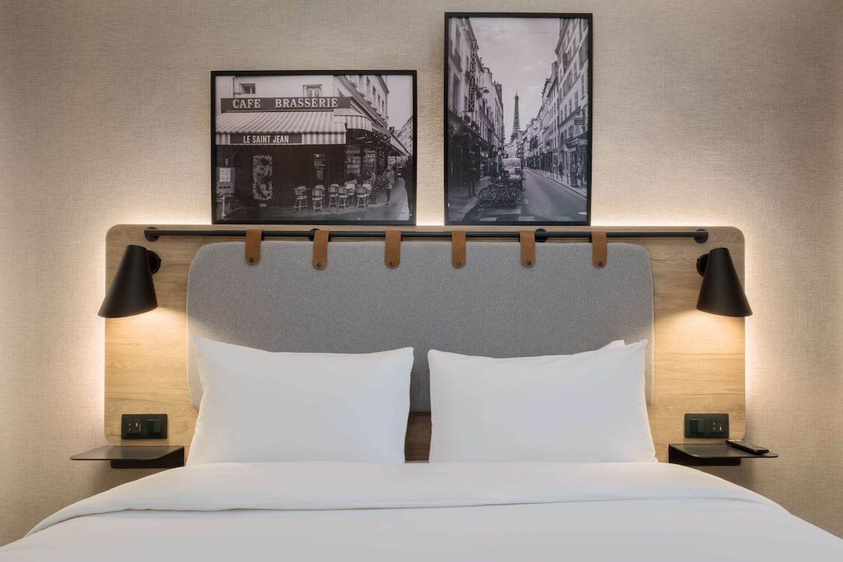 Premium bedding, desk, blackout drapes, iron/ironing board