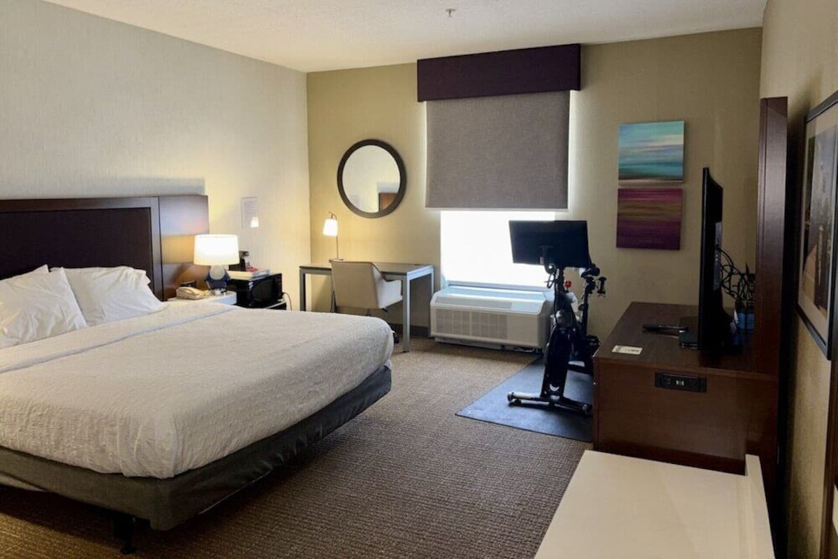 Laptop workspace, blackout drapes, iron/ironing board