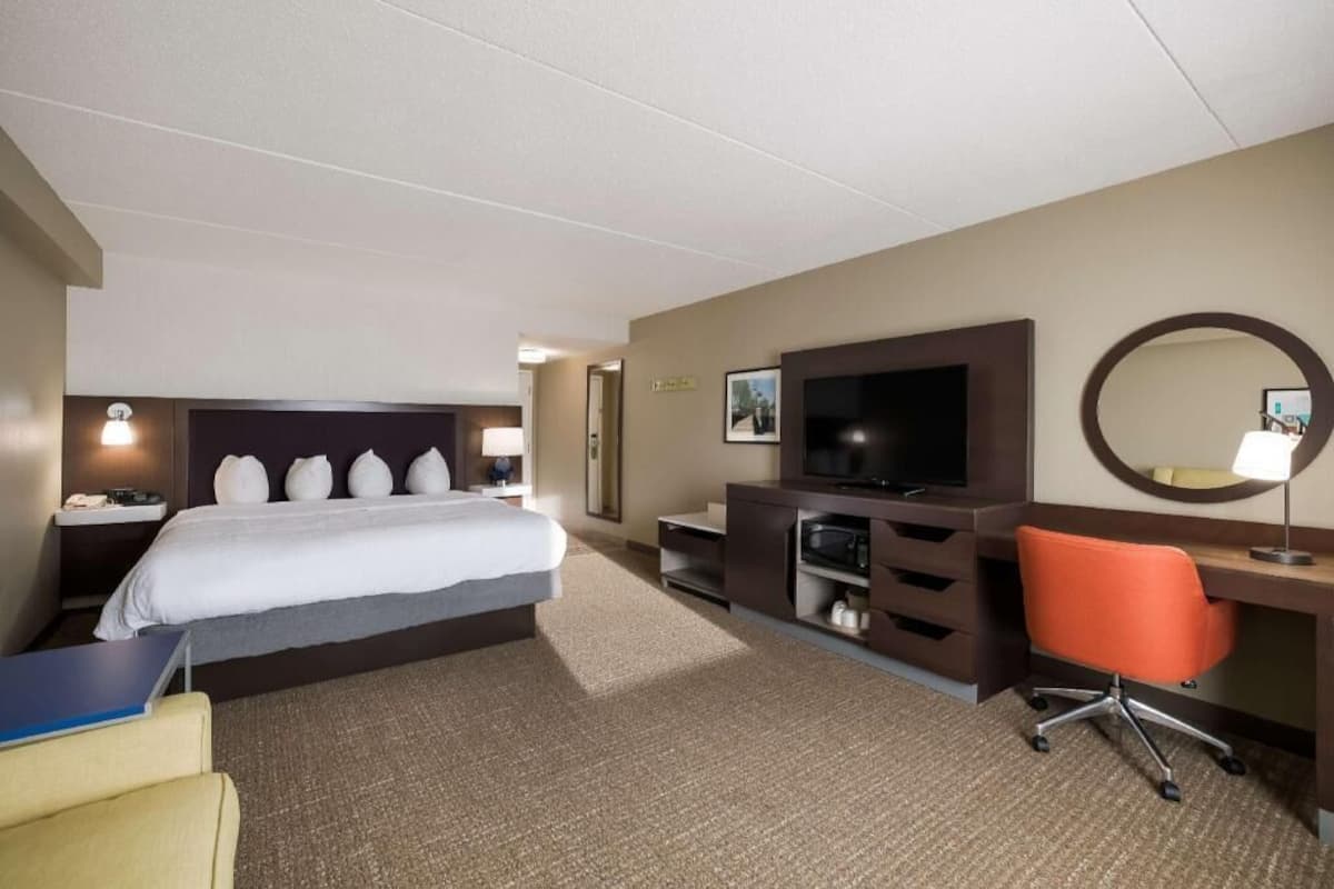Laptop workspace, blackout drapes, iron/ironing board