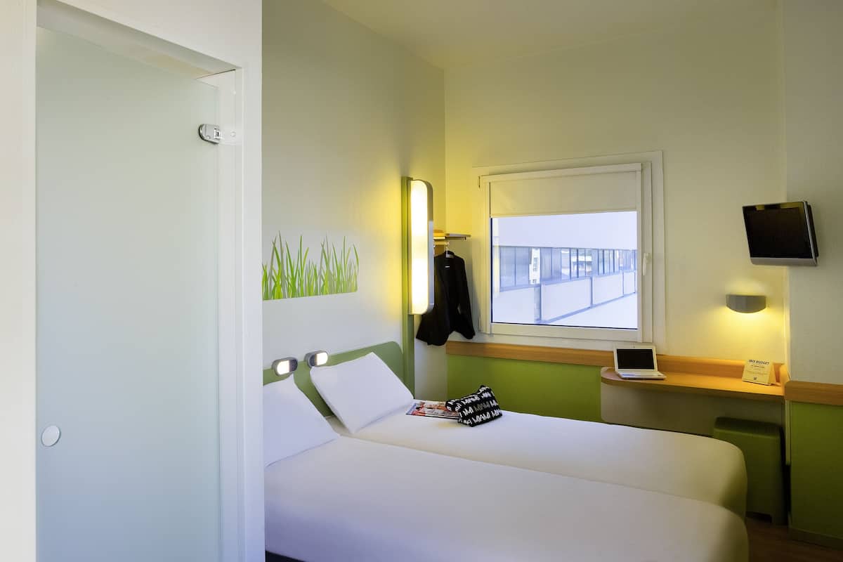 Desk, blackout curtains, free WiFi, bed sheets