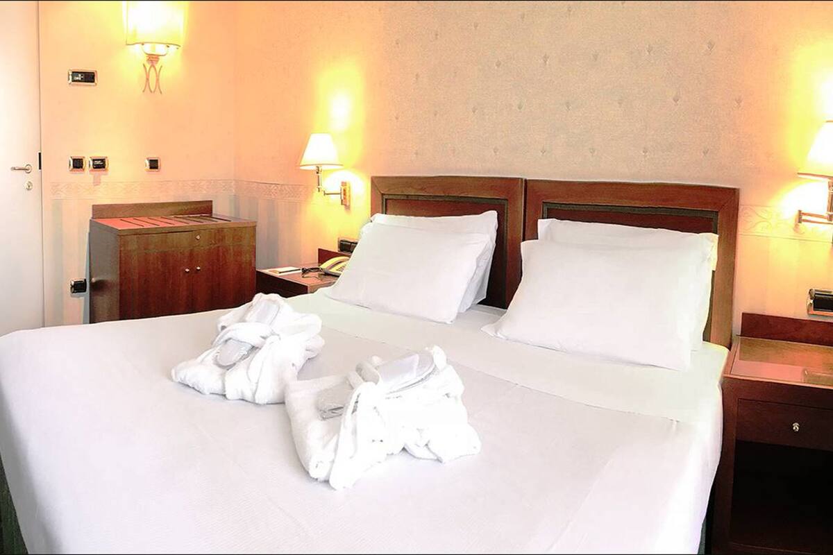 superior double room | desk, iron/ironing board