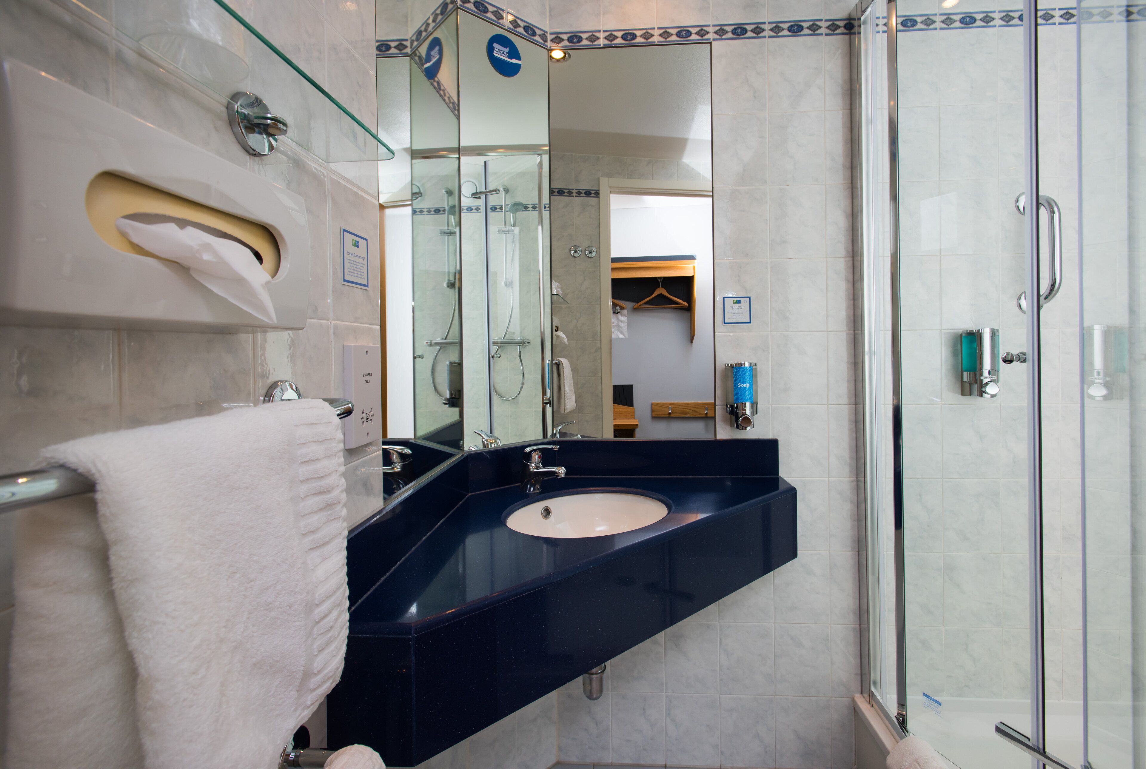 shower, free toiletries, hair dryer, towels