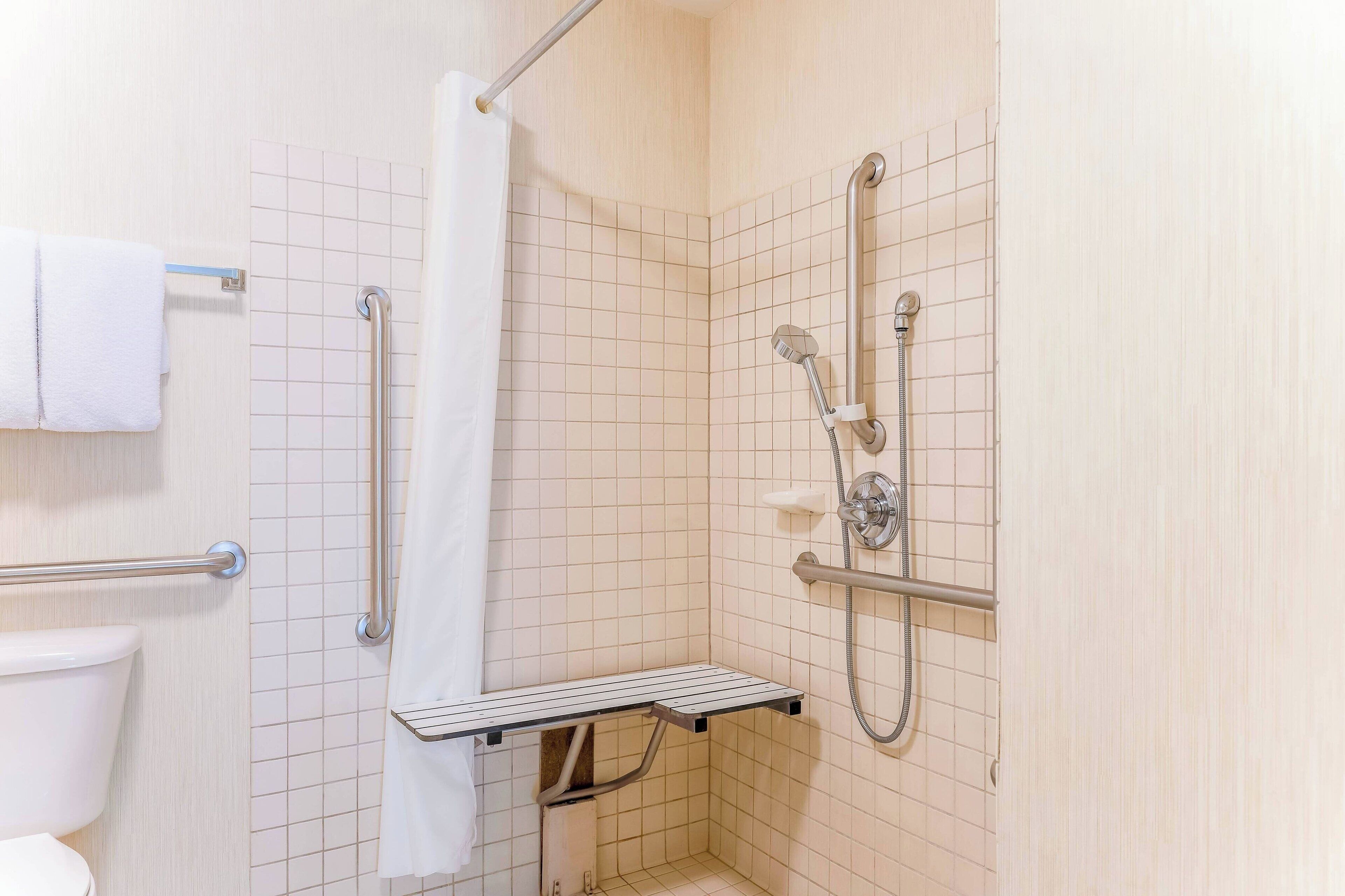 combined shower/bathtub, free toiletries, hair dryer, towels