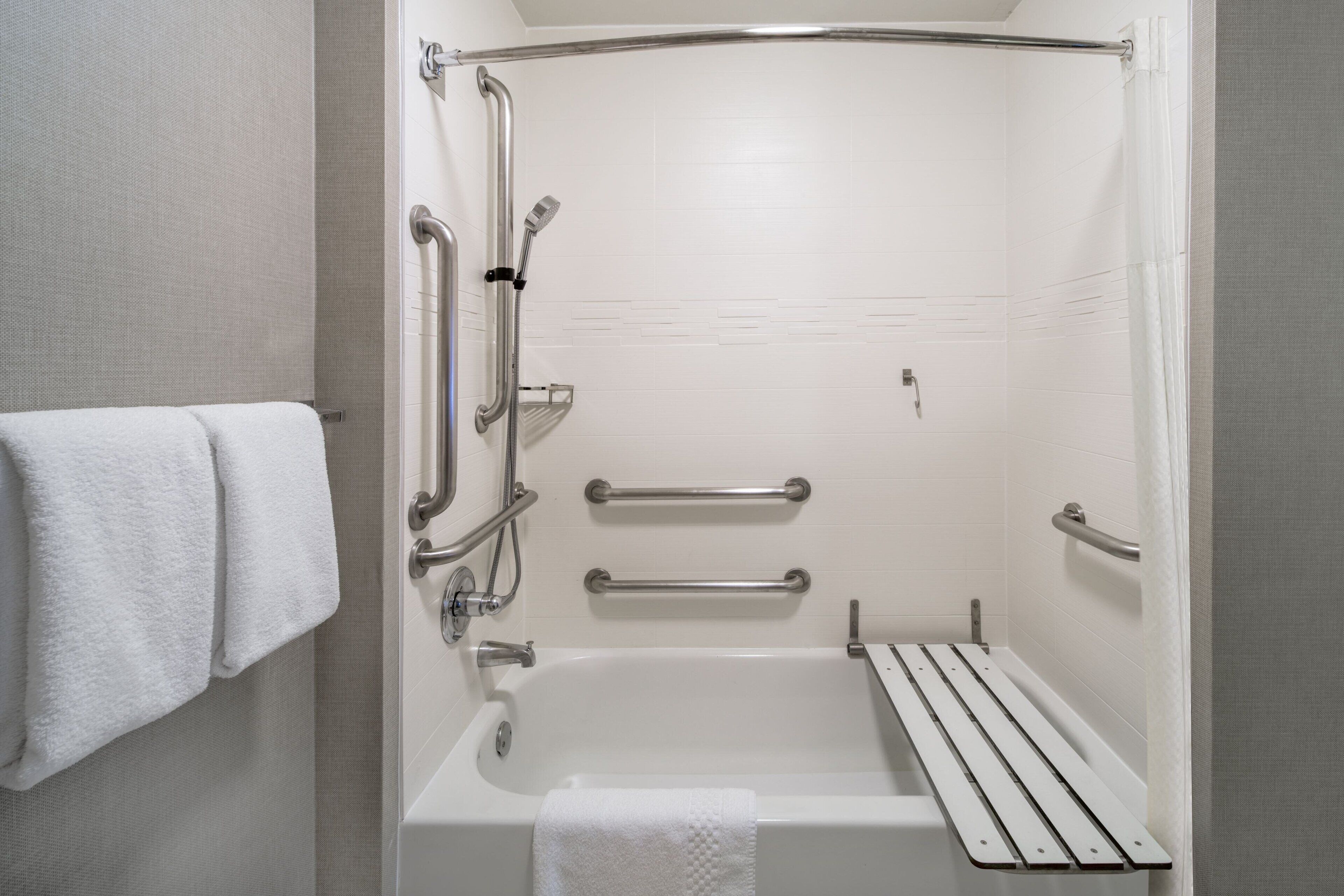 combined shower/bathtub, free toiletries, hair dryer, towels