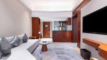 Phòng Suite tiện nghi đơn giản (Apartment) | Bộ đồ giường cao cấp, chăn bông, nệm có lớp đệm bông, minibar