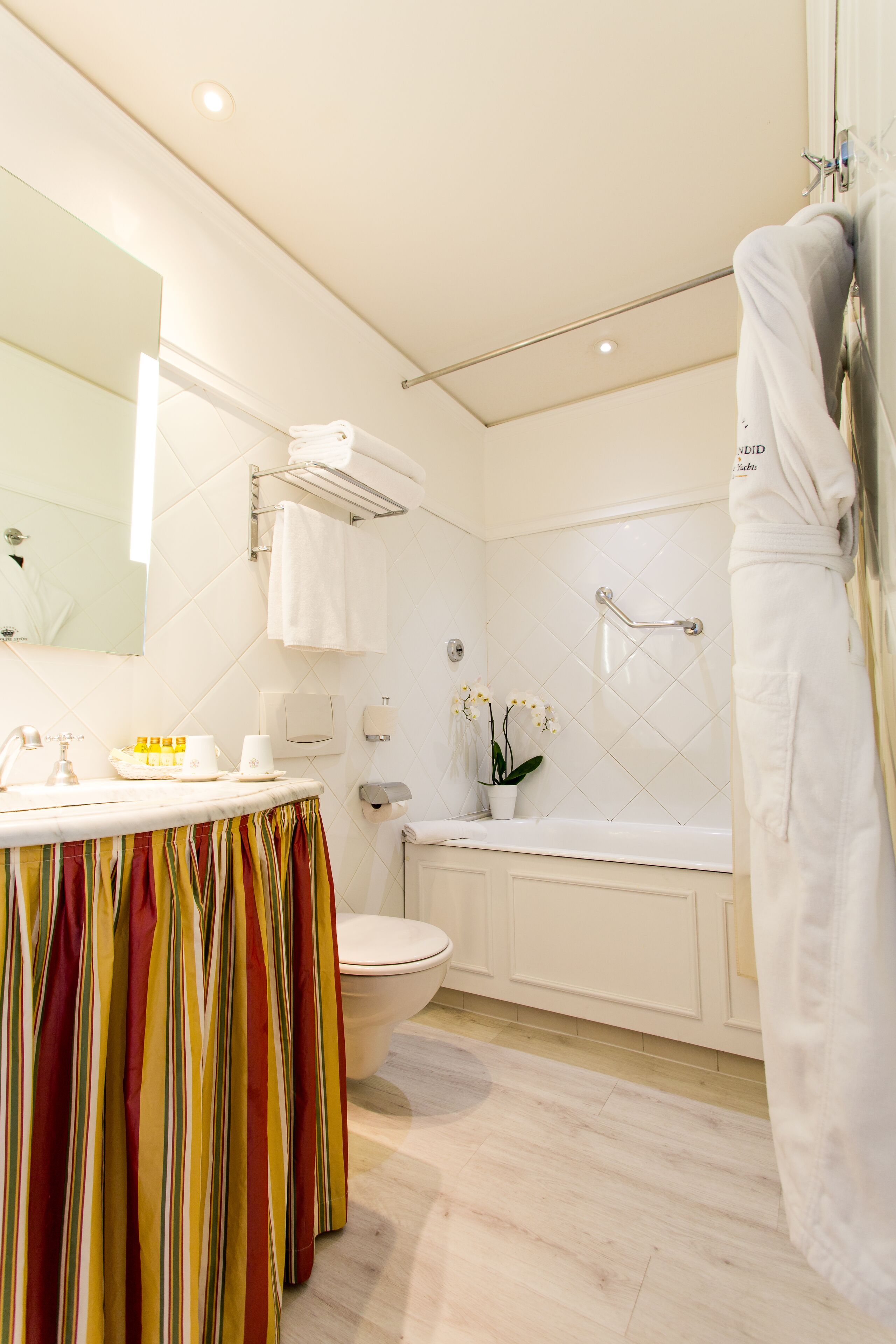 room attributed upon arrival | bathroom | combined shower/bathtub, free toiletries, hair dryer, bathrobes