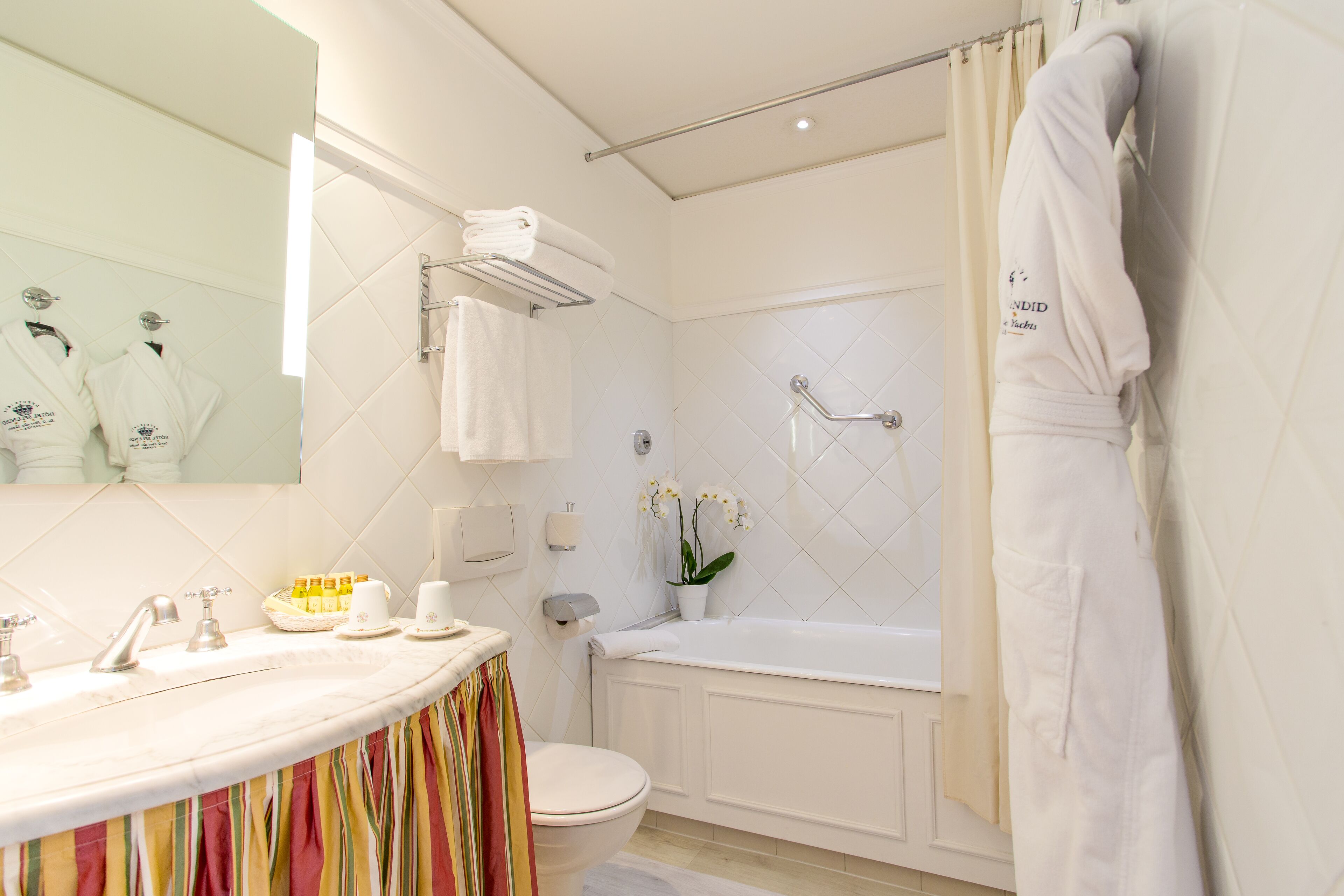 combined shower/bathtub, free toiletries, hair dryer, bathrobes