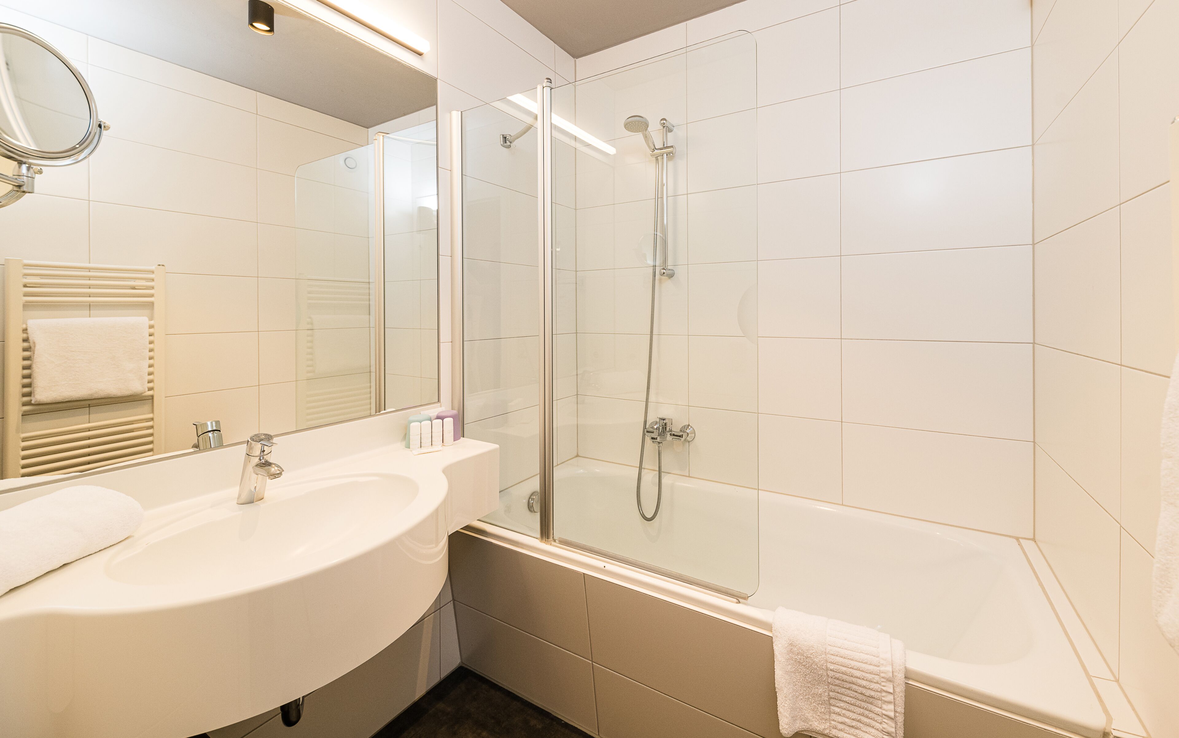comfort room | bathroom | free toiletries, hair dryer, bathrobes, slippers