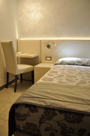 Economy Double Room | Minibar, in-room safe, individually furnished, desk