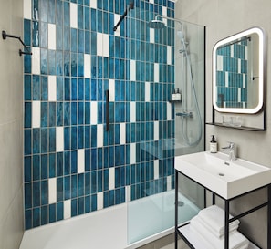 Eco-friendly toiletries, hair dryer, towels, soap