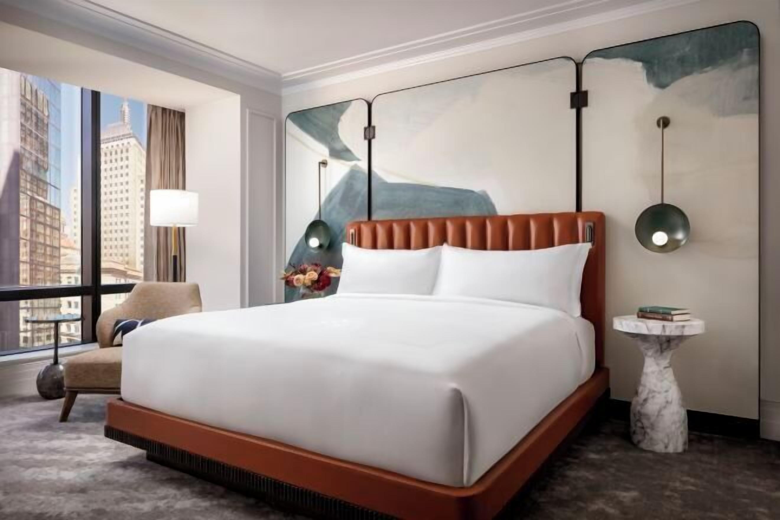 Premium bedding, down comforters, pillowtop beds, minibar