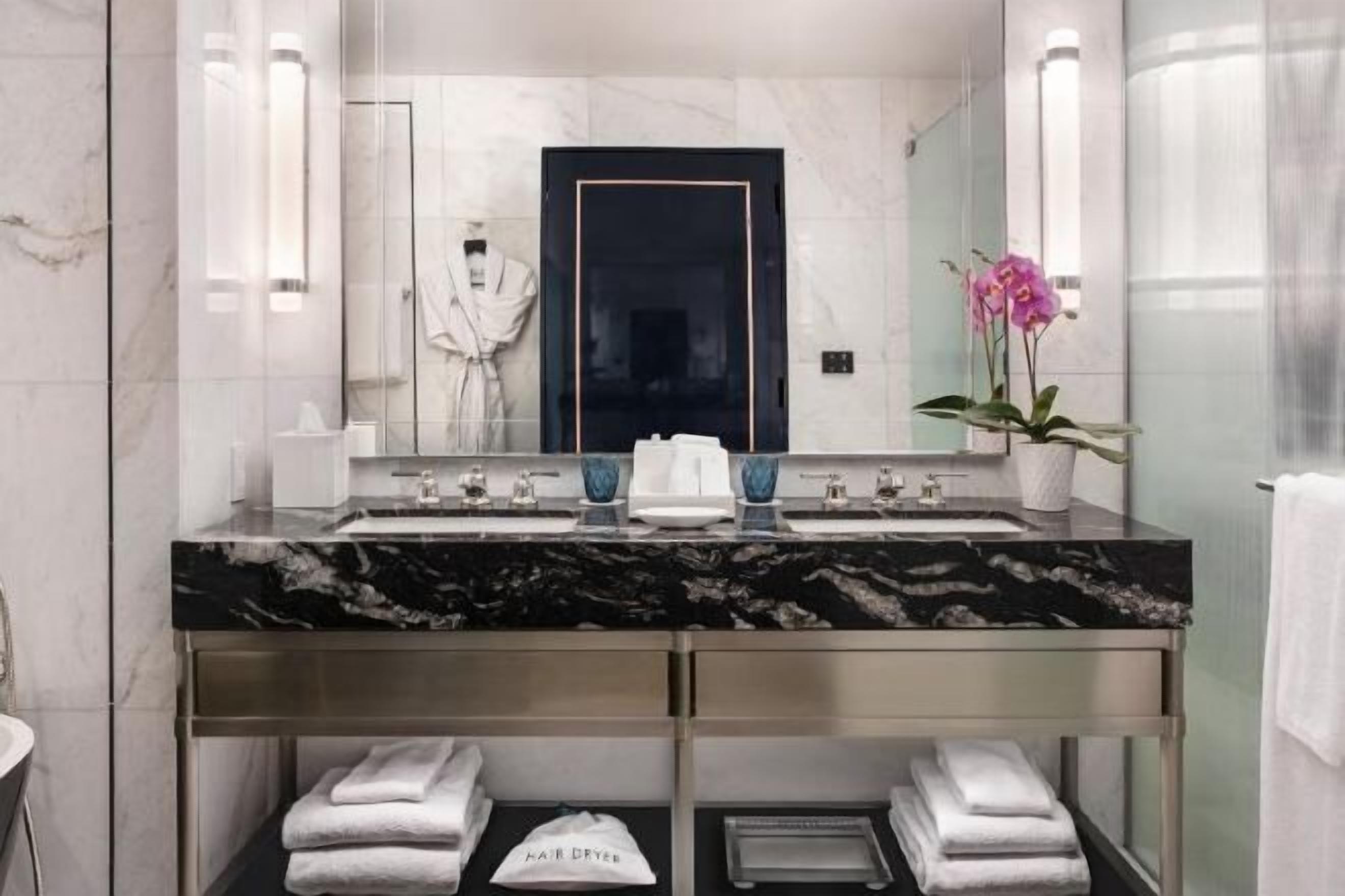 Bathroom | Designer toiletries, hair dryer, bathrobes, slippers