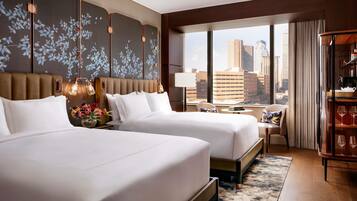 Premium bedding, down comforters, pillowtop beds, minibar