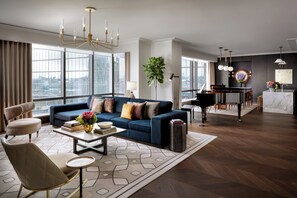 Raffles, Suite, 1 Bedroom | Living area | 65-inch TV with cable channels, books, pay films