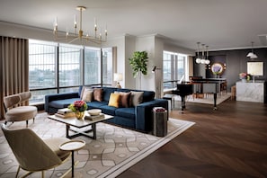 Raffles, Suite, 1 Bedroom | Living area | 65-inch TV with cable channels, books, pay films
