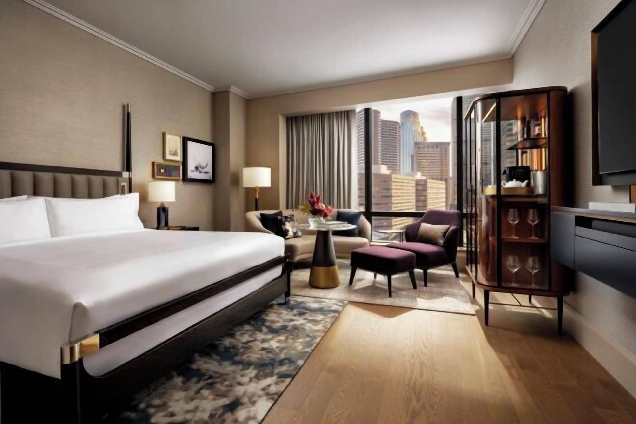 Premium bedding, down comforters, pillowtop beds, minibar