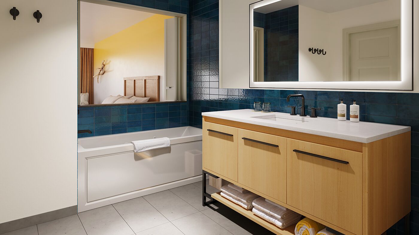 combined shower/bathtub, designer toiletries, hair dryer, towels