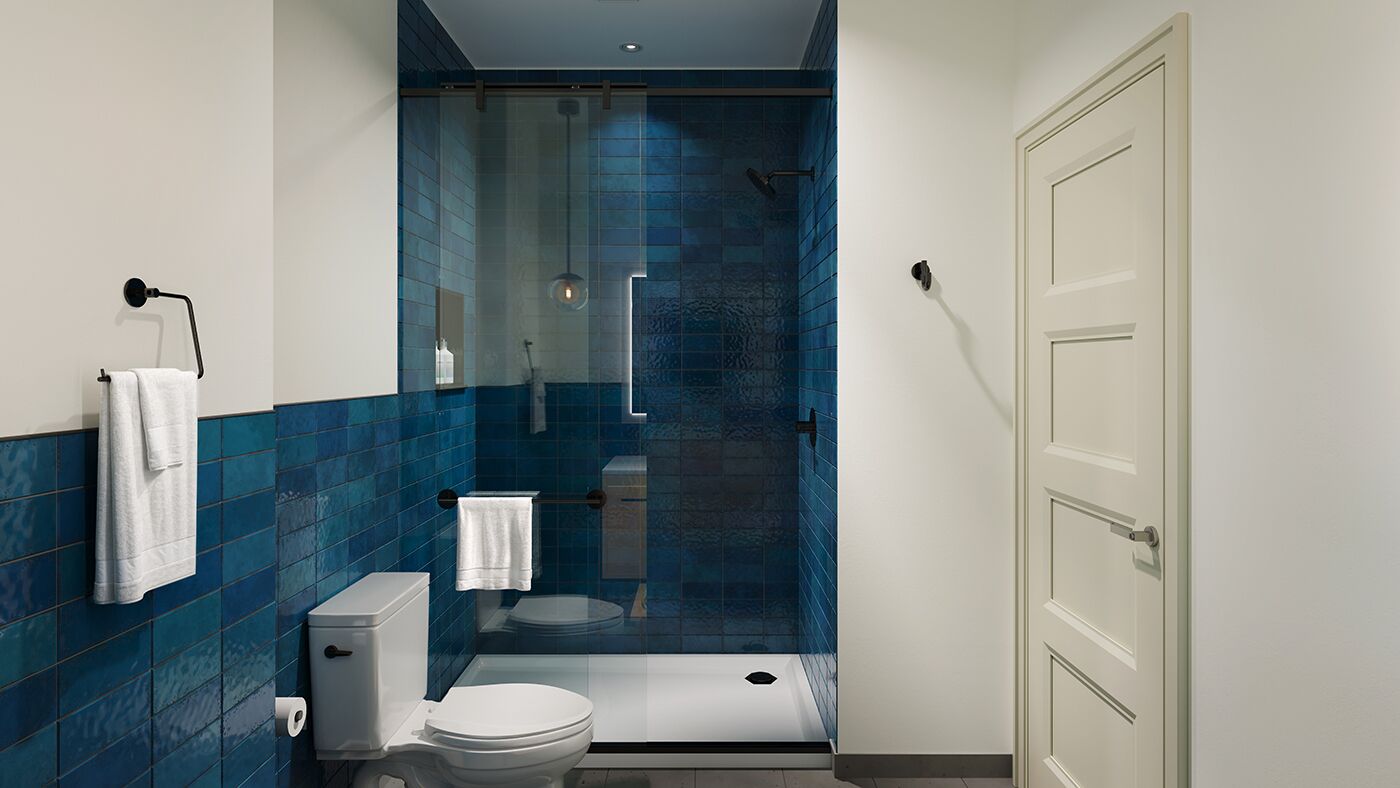 combined shower/bathtub, designer toiletries, hair dryer, towels