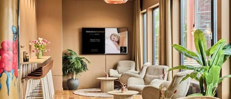 26-inch flat-screen TV with cable channels, TV