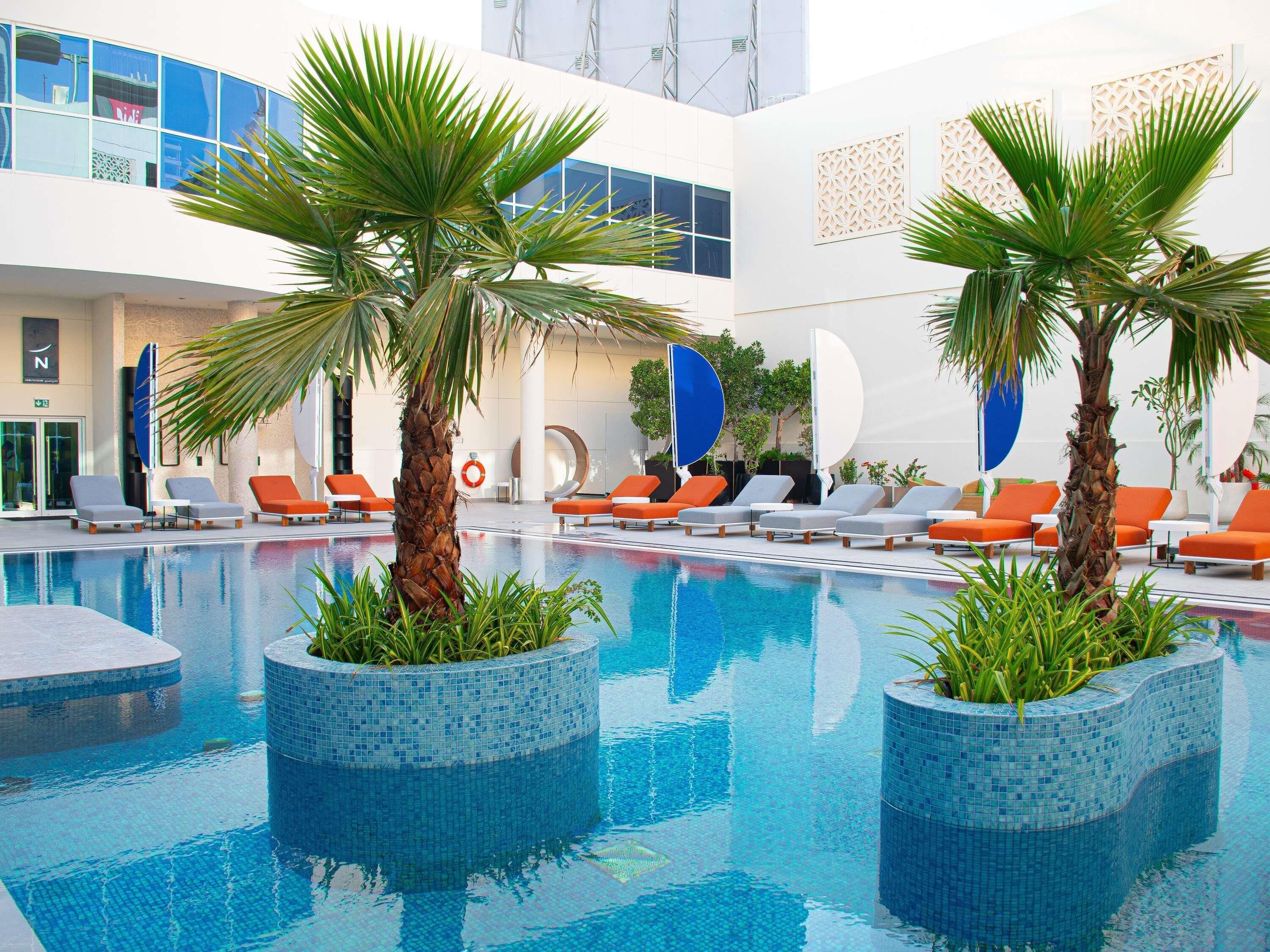 Outdoor pool, pool umbrellas, pool loungers