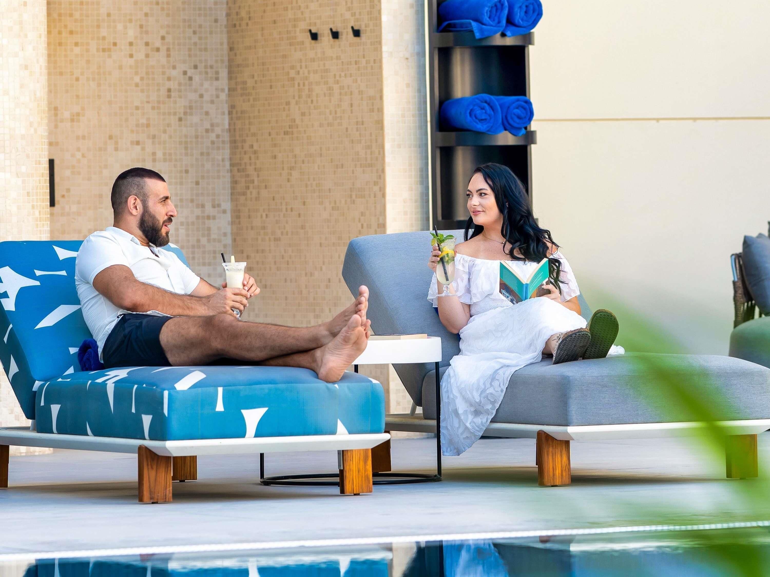 Outdoor pool, pool umbrellas, sun loungers