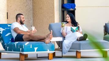 Outdoor pool, pool umbrellas, pool loungers