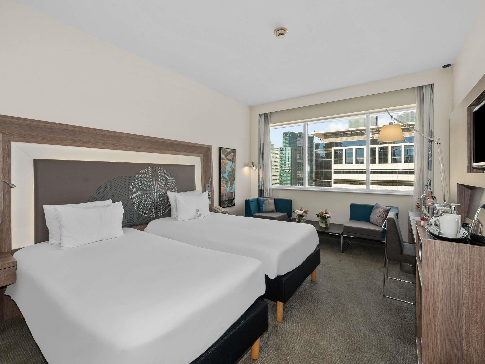 Superior Room, 2 Twin Beds | Minibar, in-room safe, desk, laptop workspace