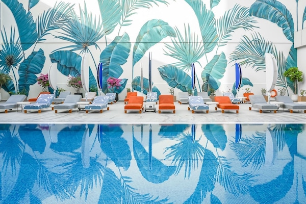 Outdoor pool, pool umbrellas, pool loungers