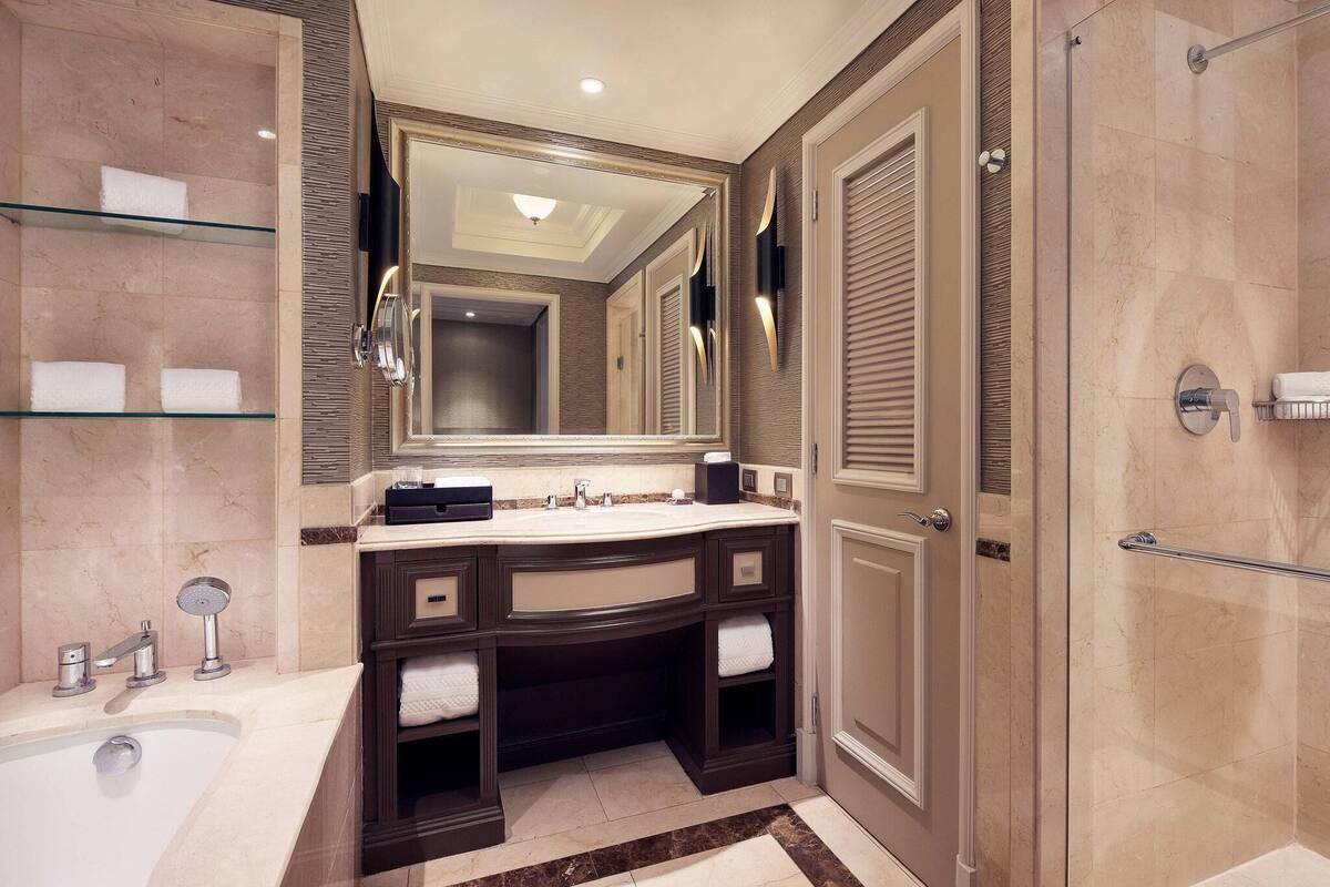 Designer toiletries, hair dryer, bathrobes, slippers