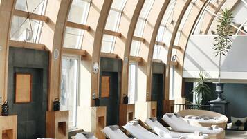 Relax in comfort with lounge chairs and plush cushions.