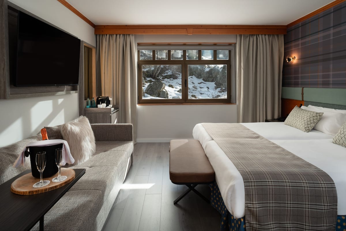 Premium bedding, down duvets, in-room safe, desk
