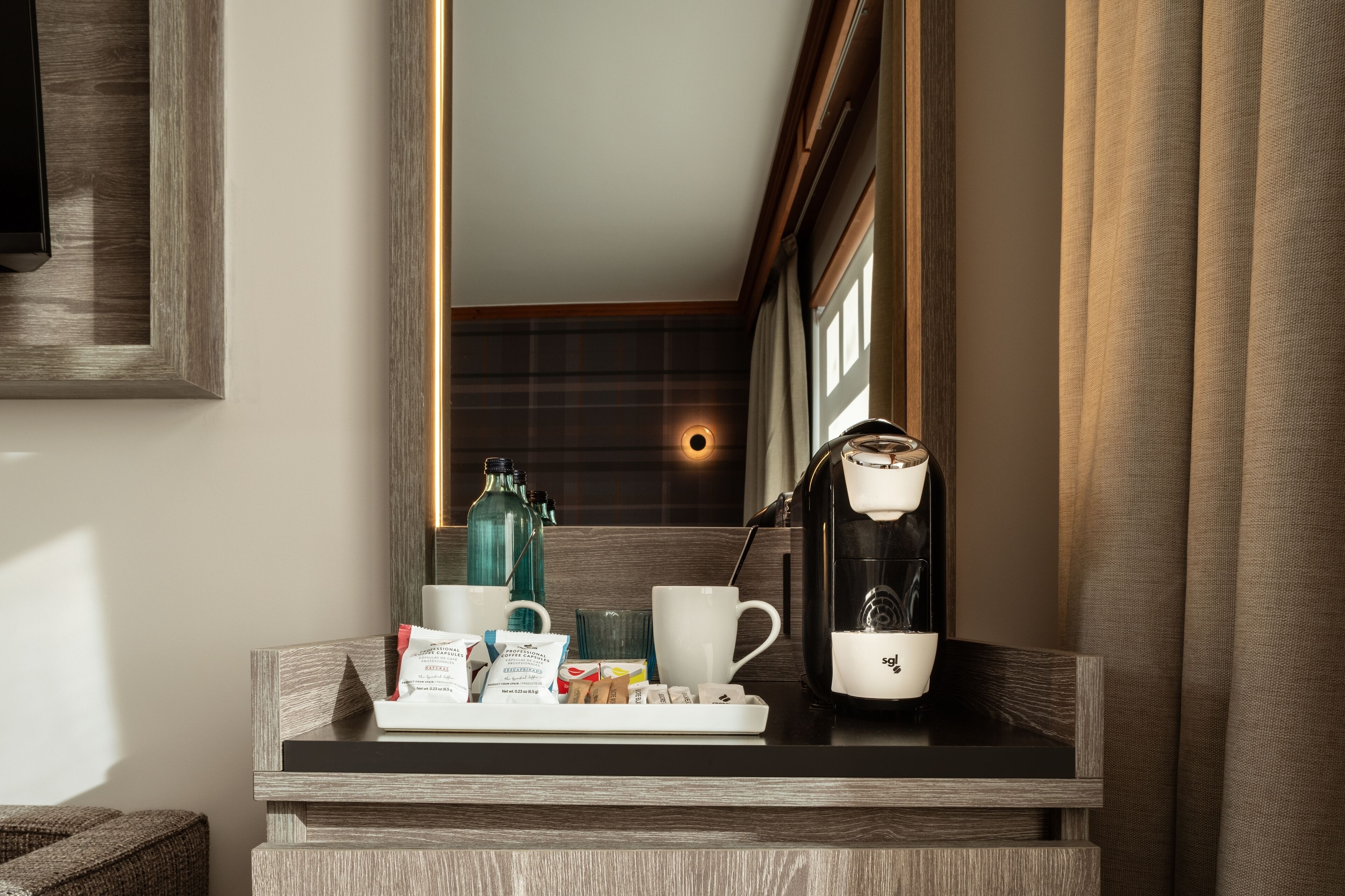 Premium bedding, down comforters, in-room safe, desk